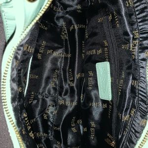 Pebbled leather bag. 15” wide, 7” tall